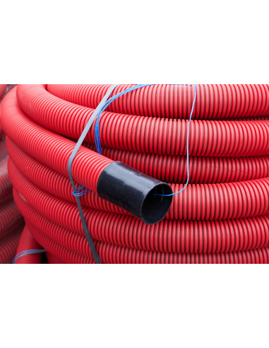 Vamzdis techninis 75mm gofruotas/lygus, raudonas, ilgis 50m. Statybinės medžiagos
